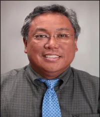 Dr Eric M Toloza, MD, PhD
