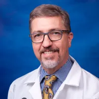 Dr. Mark E. Mehle, MD