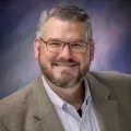 Dr. Derek S Buck