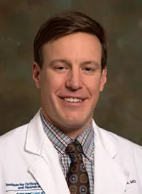 Dr. Christopher K. John, MD