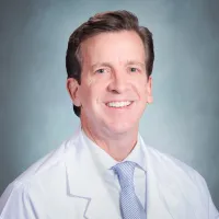 Dr Clinton E. Faulk, MD