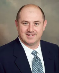 Dr. Clarence E. Coker IIi, MD