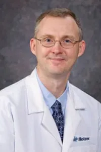 Dr. Jeremy Cuzzourt, MD