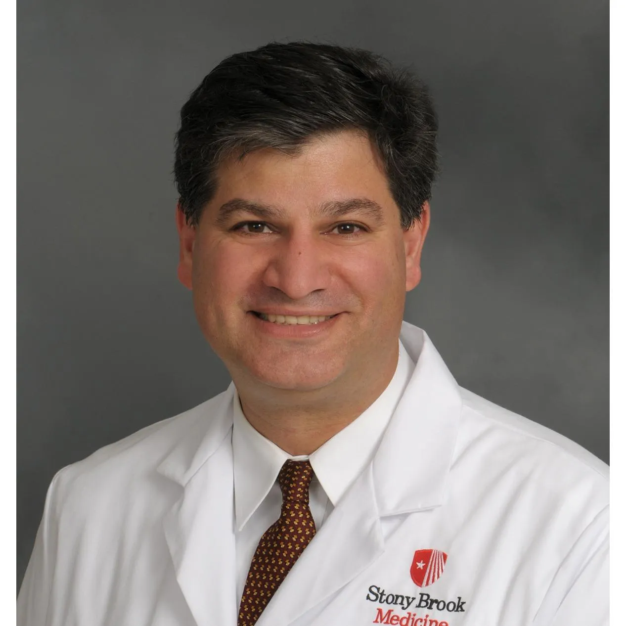 Dr. Nicholas Divaris, MD - Lake Grove, NY - Orthopedic Surgery, General Orthopedics