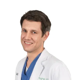 Dr. Alberic Rogman, MD