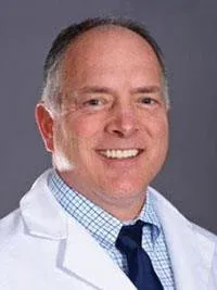 Dr. John F. Henzes, MD