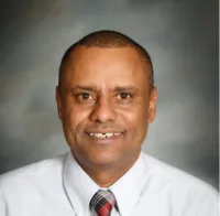 Dr. Menelik Mulu, MD