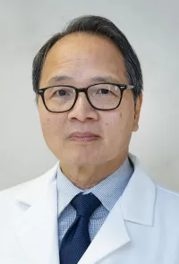 Dr. Long-Gue Hu, MD - Jersey City, NJ - Obstetrics & Gynecology