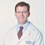 Dr. Guy M. Mckhann, MD