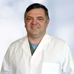 Dr. John Luka, OD