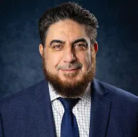Dr. Housam Aldeen Sarakbi, MD, FACR, RhMSUS