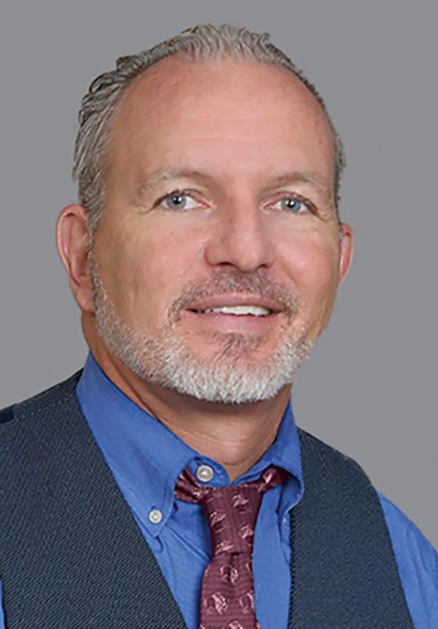 Dr. Paul Guttuso