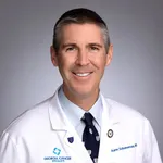 Dr. Aaron J Scheuneman, MD